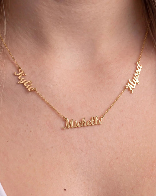 Three-name necklace worn close up: Kylie, Michelle and Alyssa